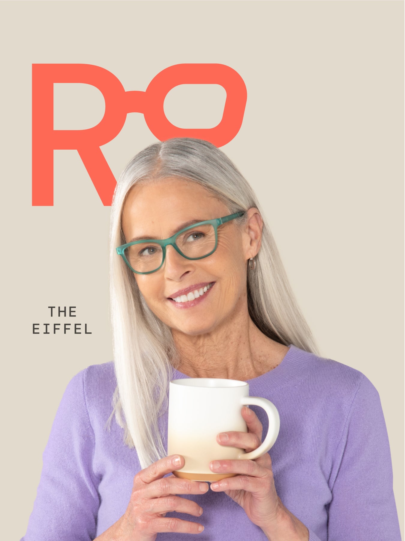 Woman holding a mug wearing the eiffel bifocals on a beige background with a coral logo in the background