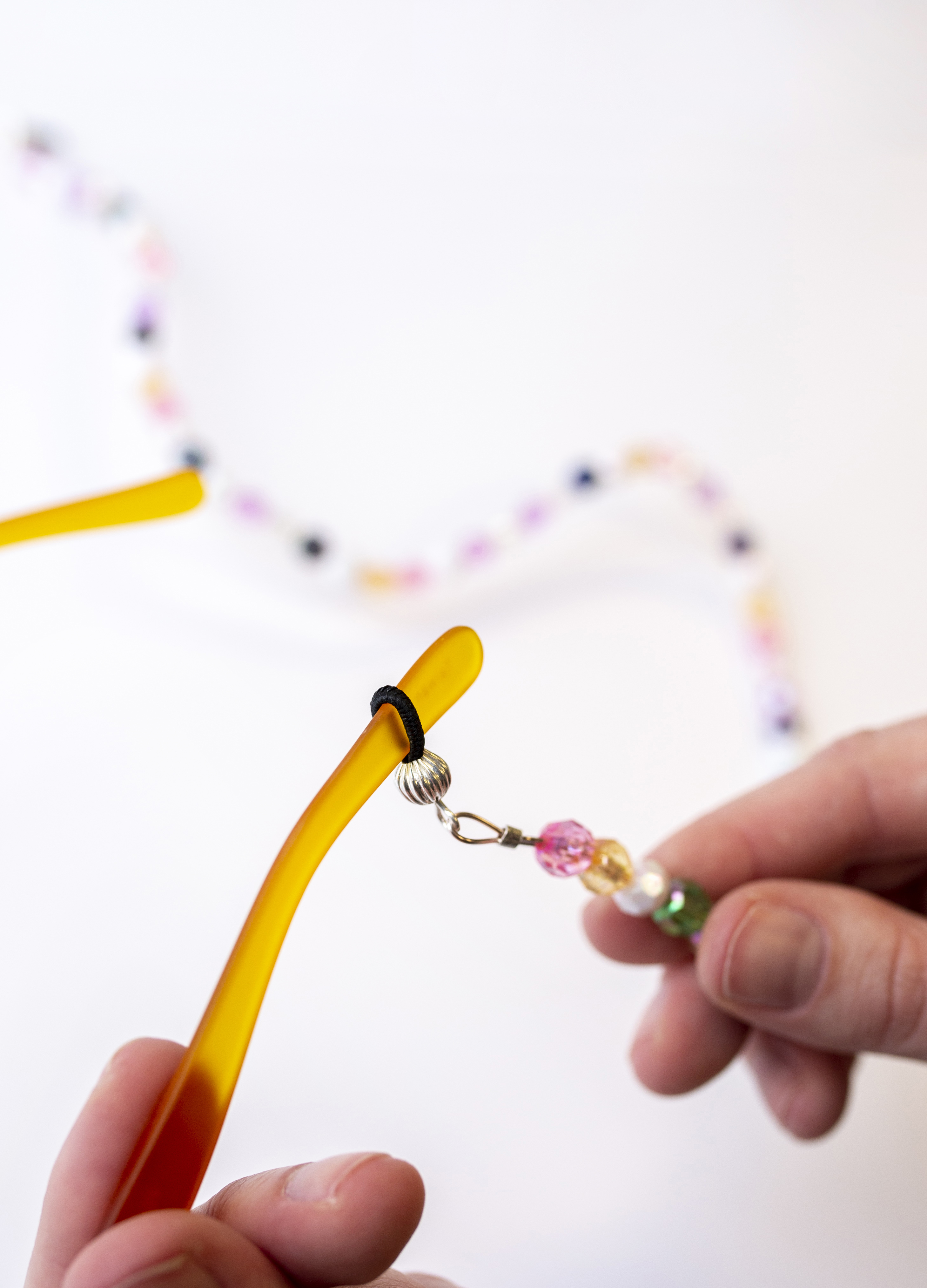 eyeglass chain on glasses temple