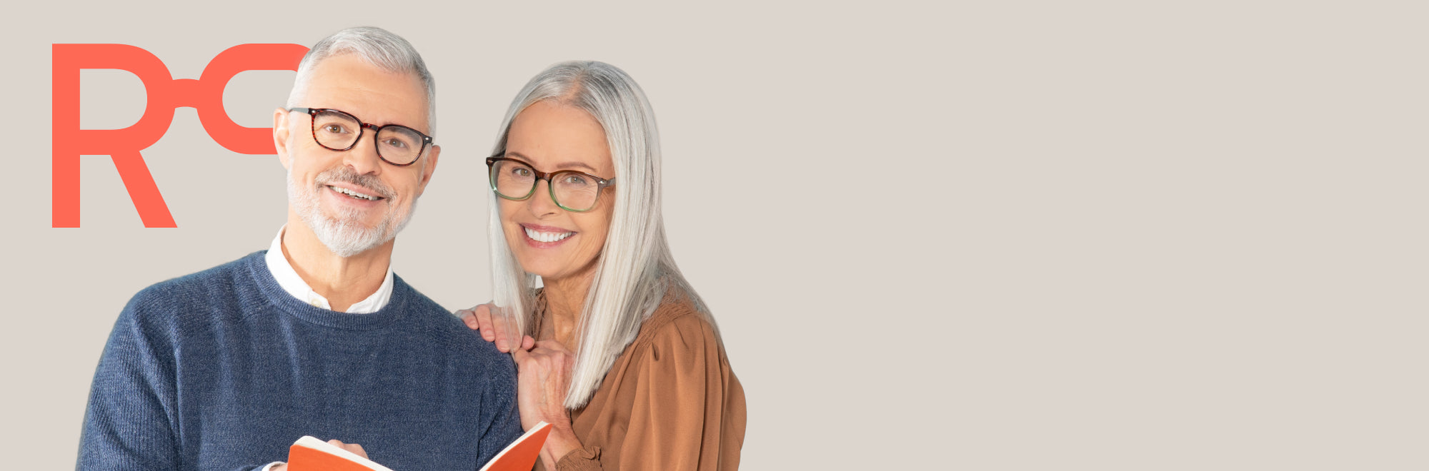 Two people wearing glasses with a visible brand logo on a light gray background